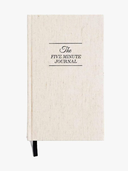 Intelligent Change The Five Minute Journal beige journal on light gray background